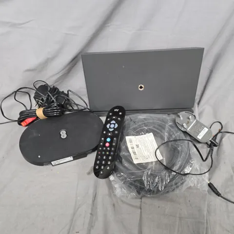 APPROXIMATELY 12 ASSORTED HOUSEHOLD ITEMS TO INCLUDE CABLES, TV REMOTES, ROUTERS, ETC