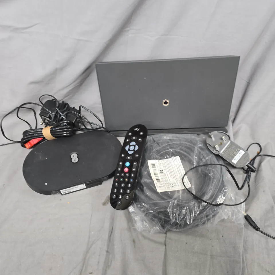 APPROXIMATELY 12 ASSORTED HOUSEHOLD ITEMS TO INCLUDE CABLES, TV REMOTES, ROUTERS, ETC