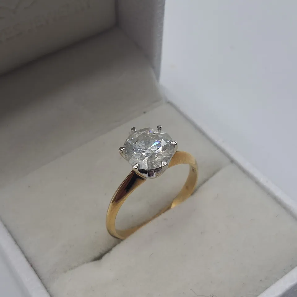 18CT GOLD SOLITAIRE RING SET WITH A NATURAL DIAMOND WEIGHING +-1.56CT