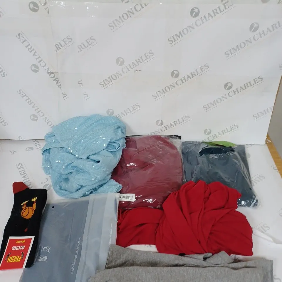 LARGE BOX OF ASSORTED CLOTHING ITEMS IN VARIOUS COLOURS AND SIZES INCLUDING TROUSERS , TOPS AND JUMPERS 
