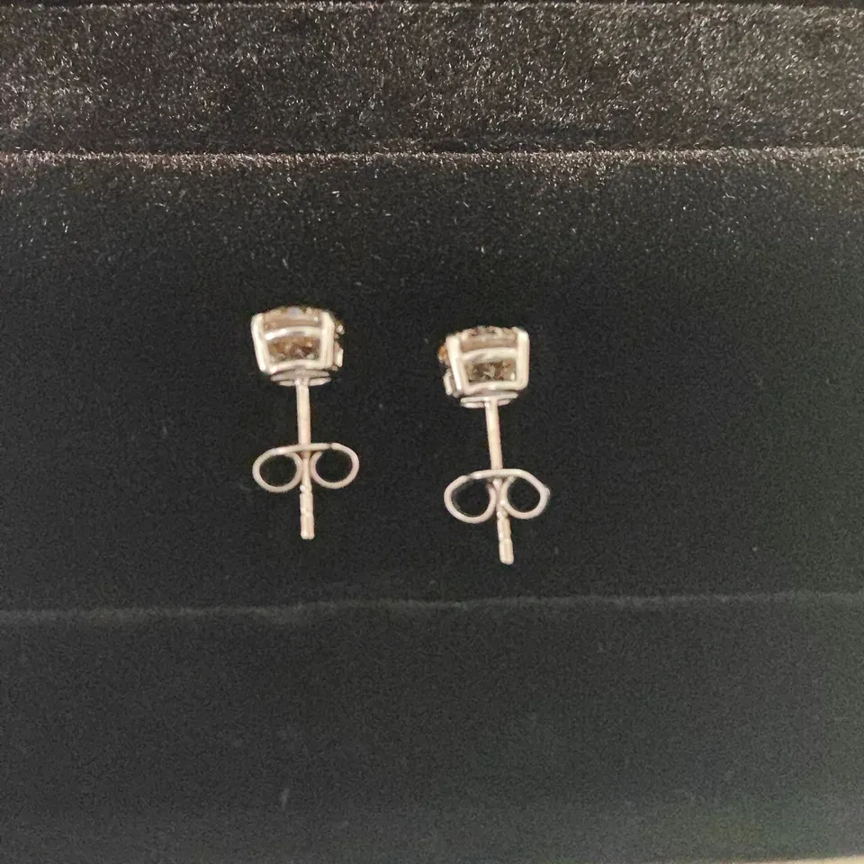 18CT WHITE GOLD STUD EARRINGS SET WITH NATURAL DIAMONDS WEIGHING +-2.03CT