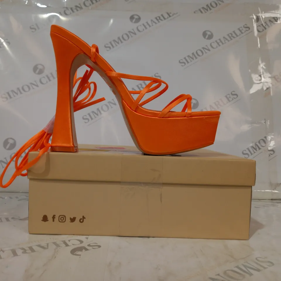 BOXED PAIR OF PUBLIC DESIRE ENDLESS POTENTIAL OPEN TOE STRAPPY PLATFORM HEELED SANDALS IN ORANGE SATIN UK SIZE 6