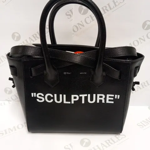 OFF-WHITE BLACK AND WHITE CUT FLAP BAG