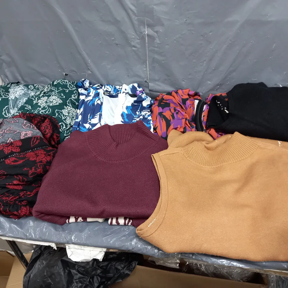 BOX OF APPROXIMATELY 10 ASSORTED PIECES OF CLOTHING IN VARIOUS STYLES, SIZES, AND BRANDS 