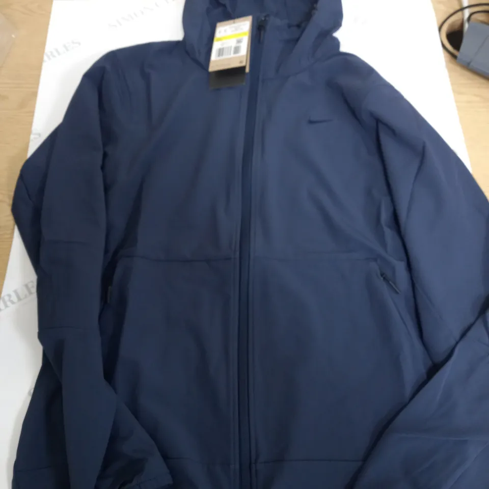 NIKE WOVEN NAVY JACKET - S