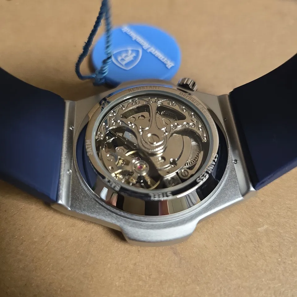 MENS BERNARD REINHARDT MECHANICAL SKELETON WATCH WITH BLUE RUBBER STRAP