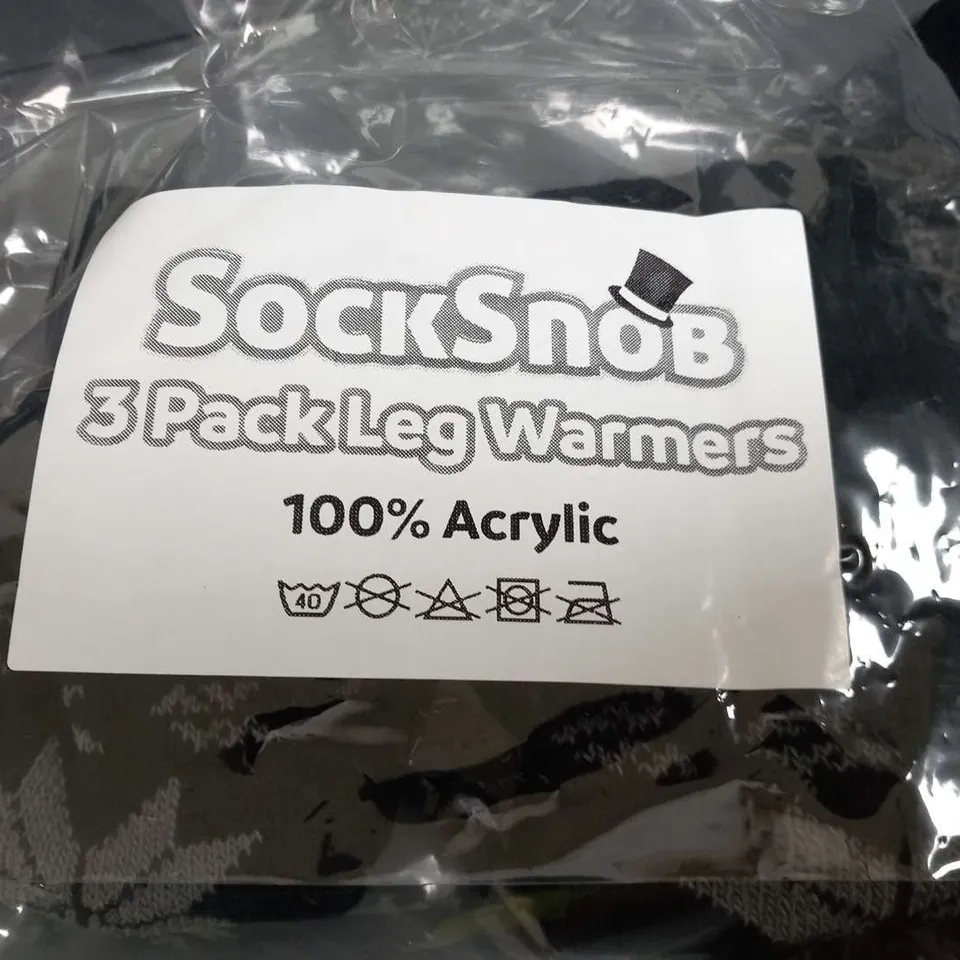 APPROXIMATELY 30 PACKS OF THREE SOCK SNOB 100% ACRYLIC LEG WARMERS