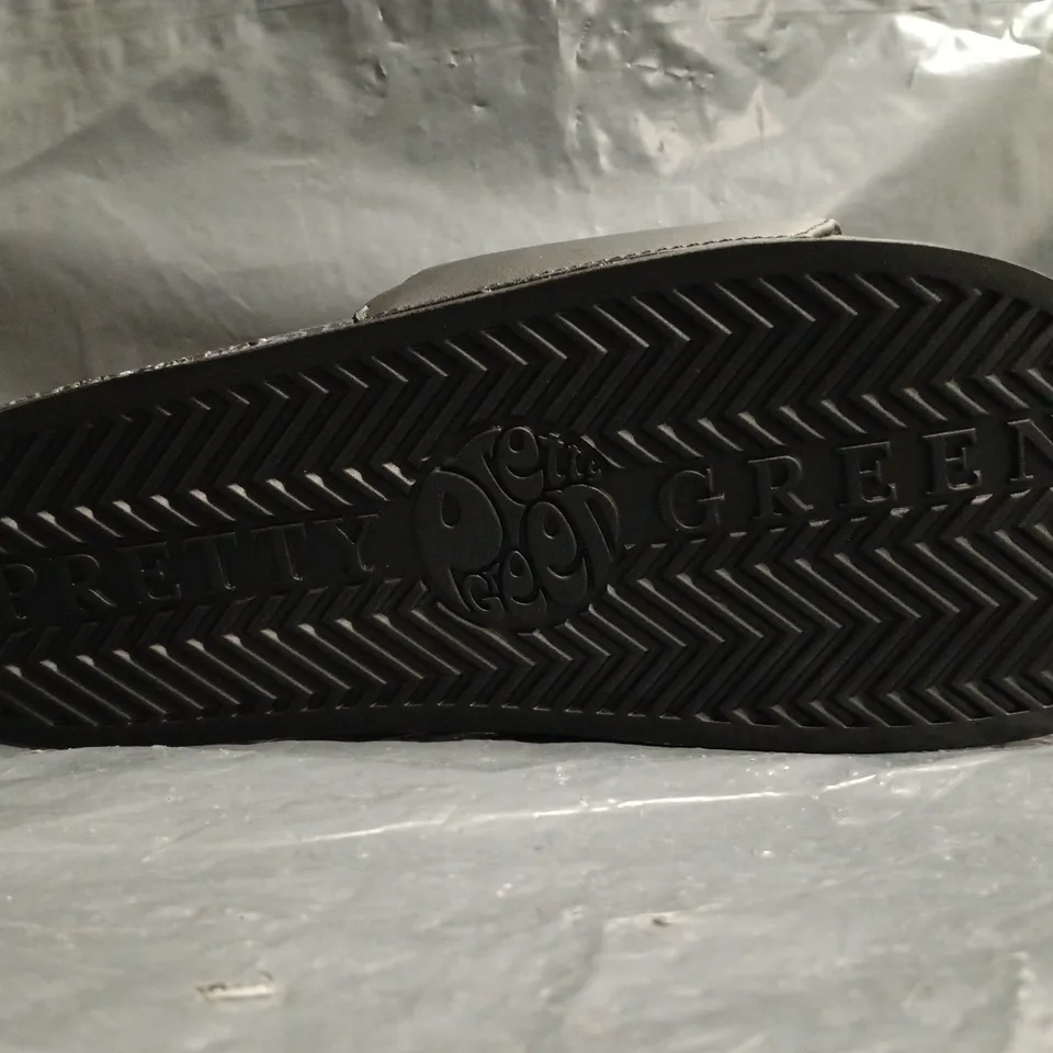 PAIR OF PRETTY GREEN MOCKU SLIDERS IN BLACK SIZE 9