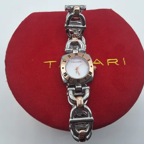 TAHARI WHITE DIAL LADIES WATCH WITH STAINLESS STEEL BACK AND RED GIFT BOX