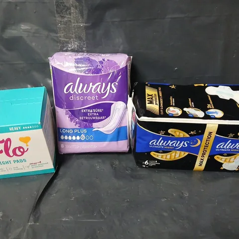 APPROXIMATELY 8 PACKS OF FEMININE HYGIENE PRODUCTS TO INCLUDE ALWAYS AND FLO