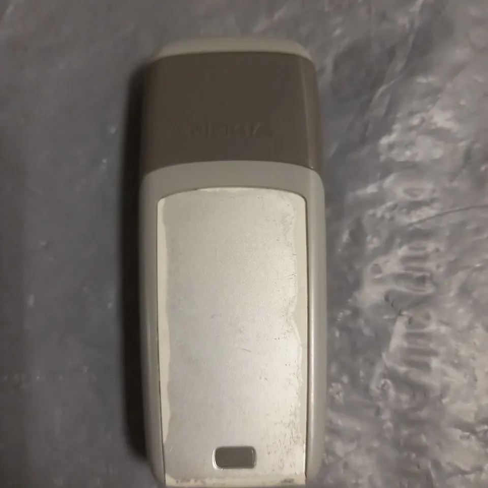 NOKIA MOBILE PHONE SILVER MODEL UNSPECIFIED