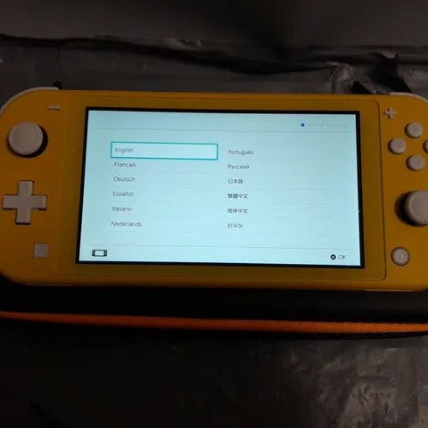 NINTENDO SWITCH IN YELLOW WITH CARRY CASE - HDH-001