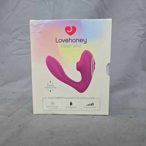 BOXED LOVEHONEY MON AMI DUAL VIBRATING & SUCTION STIMULATOR