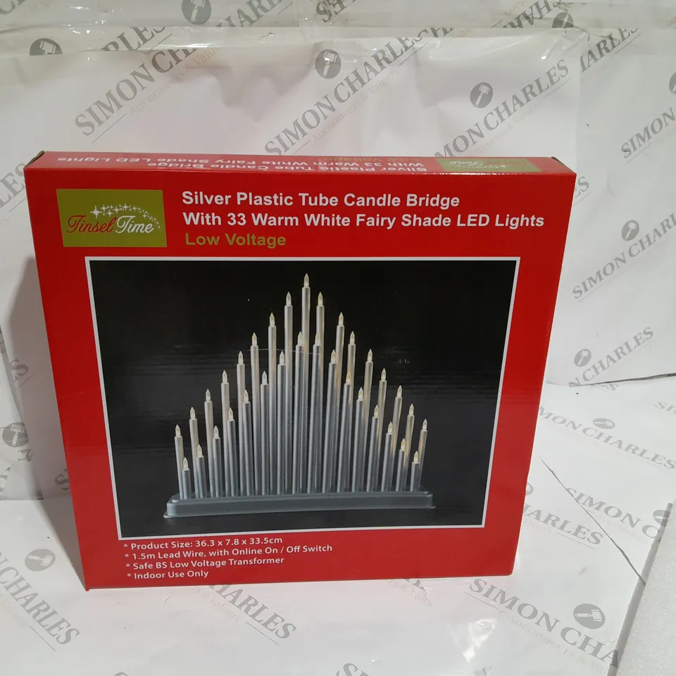 SILVER PLASTIC TUBE CANDLE BRIDGE WITH 33 WARM WHITE FAIRY SHADE LED LIGHTS