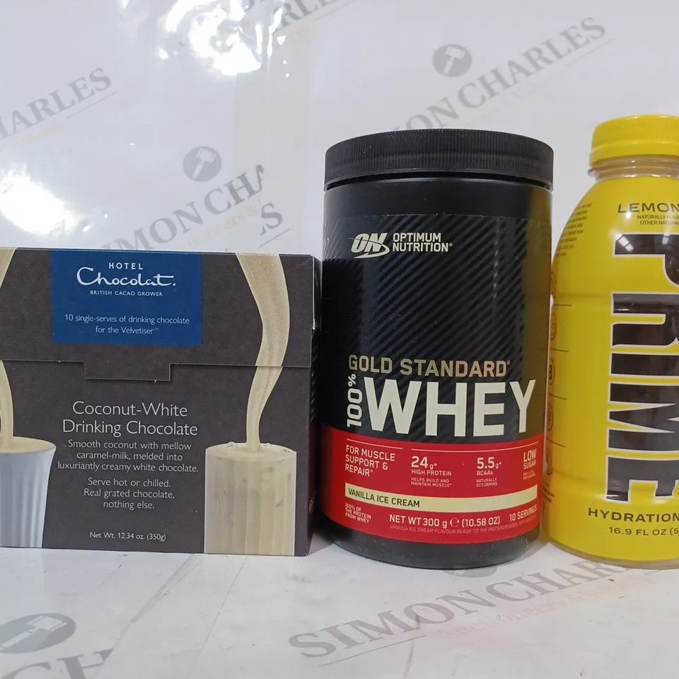 APPROXIMATELY 5 ASSORTED FOOD & DRINK ITEMS TO INCLUDE PRIME 500ML BOTTLE IN LEMONADE FLAVOUR, OPTIMUM NUTRITION GOLD STANDARD WHEY IN VANILLA ICE CREAM FLAVOUR, HOTEL CHOCOLAT COCONUT-WHITE DRINKING 