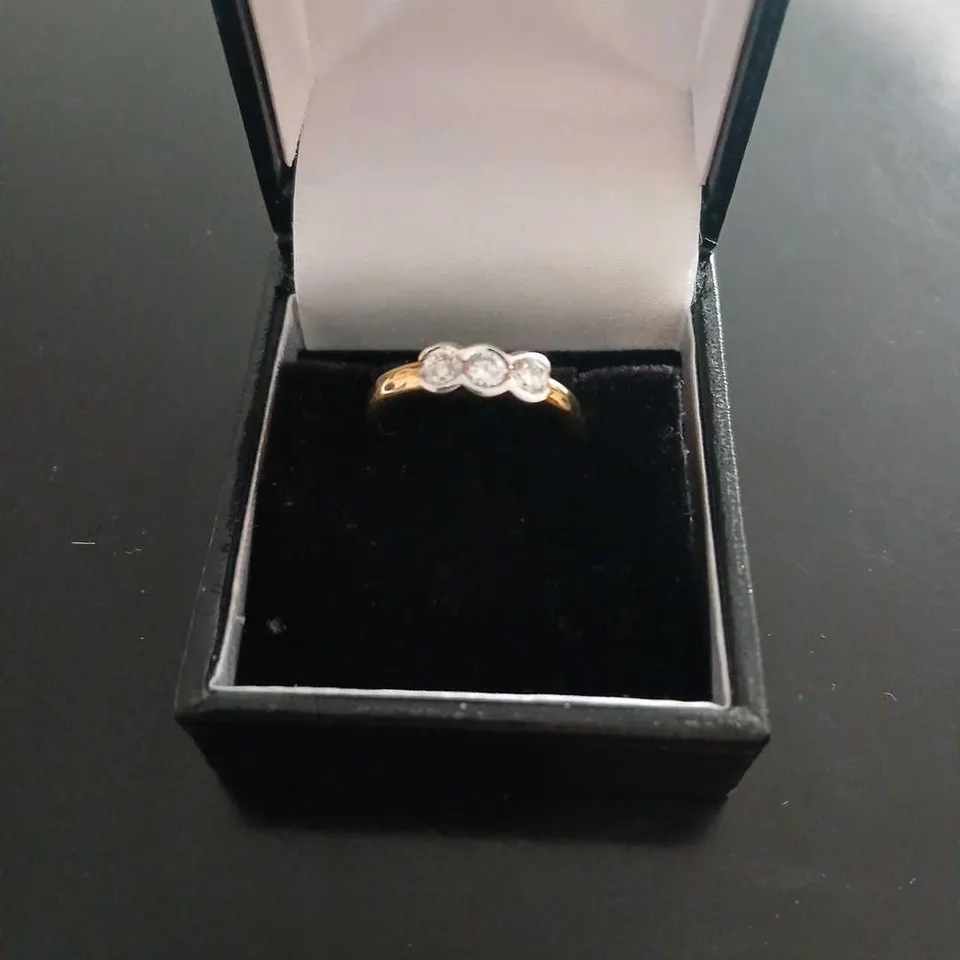 18CT GOLD THREE STONE RING RUB OVER SET WITH NATURAL DIAMONDS