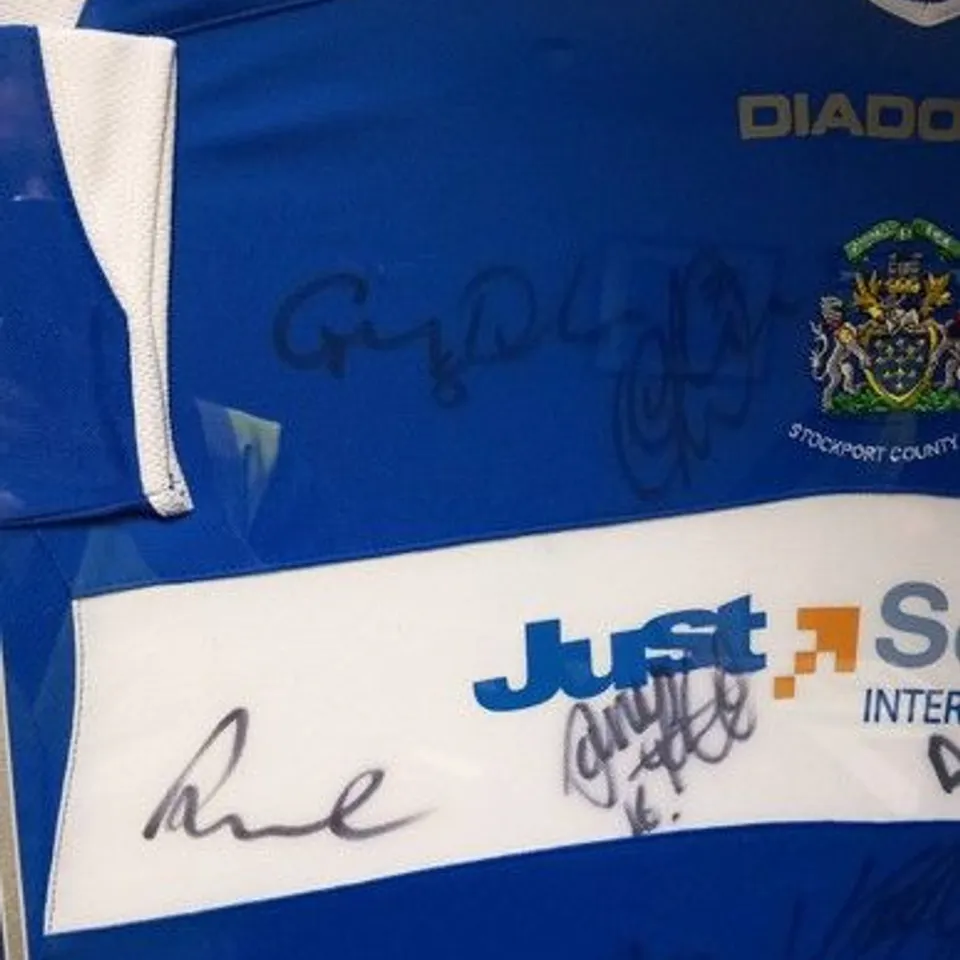 FRAMED, MOUNTED AND SIGNED STOCKPORT COUNTY FC HOME JERSEY