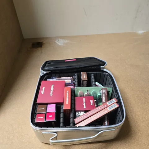 HUDABEAUTY ASSORTED COSMETICS IN SIVER CARRY CASE 