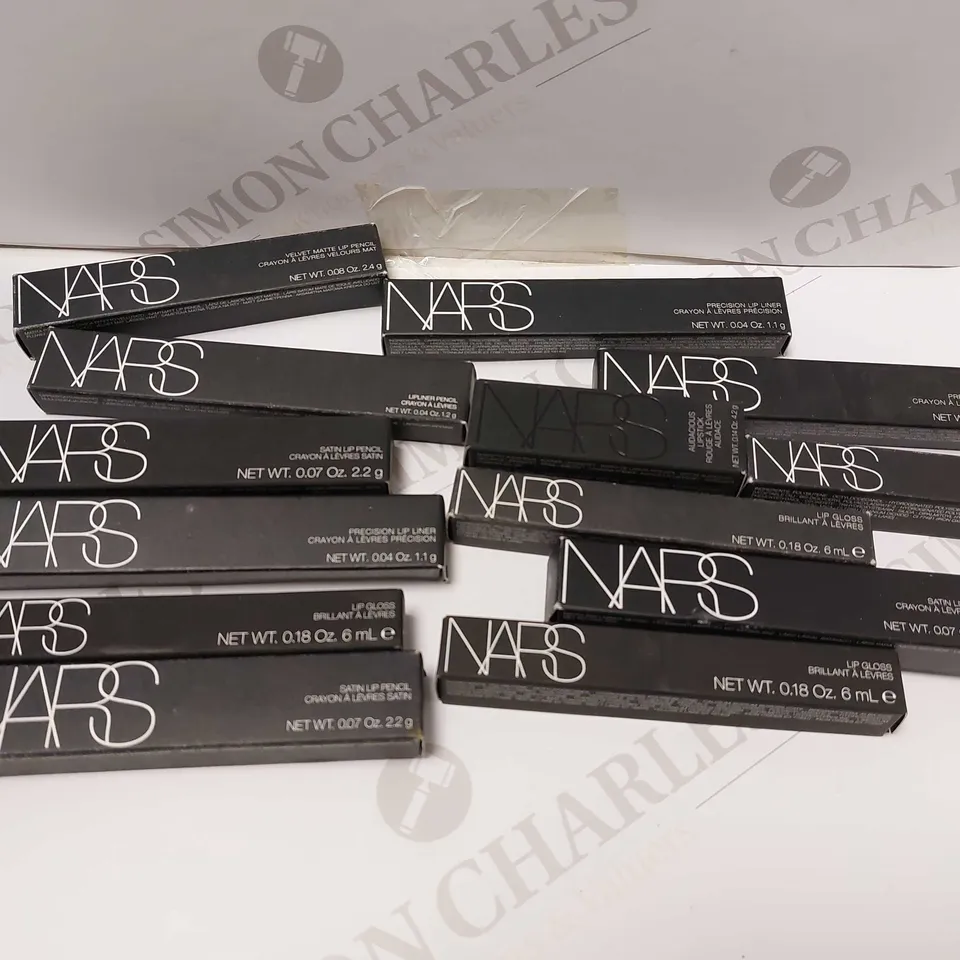 BOX OF APPROX 20 NARS MAKE UP ITEMS TO INCLUDE NARS AUDACIOUS LIPSTICK, NARS SATIN LIP PENCIL AND NARS LIP GLOSS