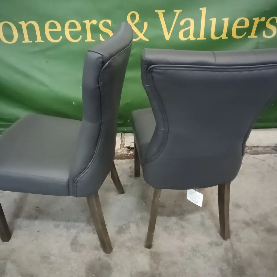 PAIR OF GREY FAUX LEATHER UPHOLSTERED DINING CHAIRS 