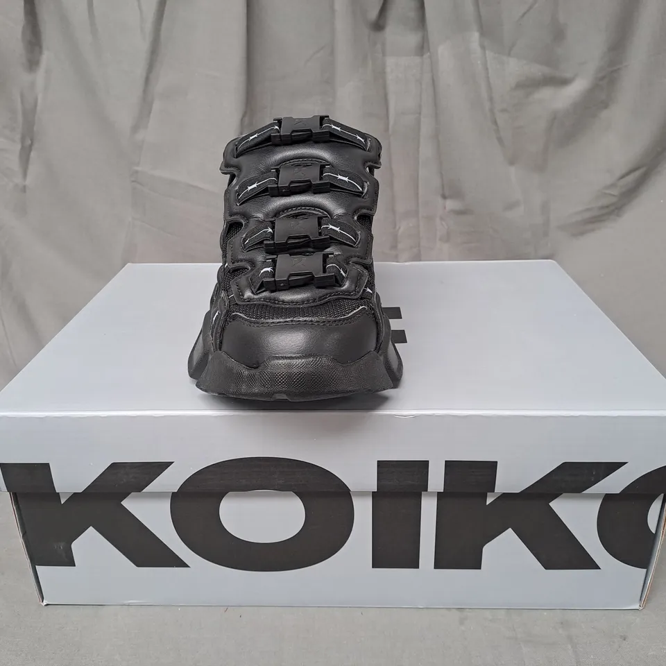 BOXED PAIR OF KOI THE BEAST MEN'S BLACK WIRE TRAINERS IN BLACK UK SIZE 7