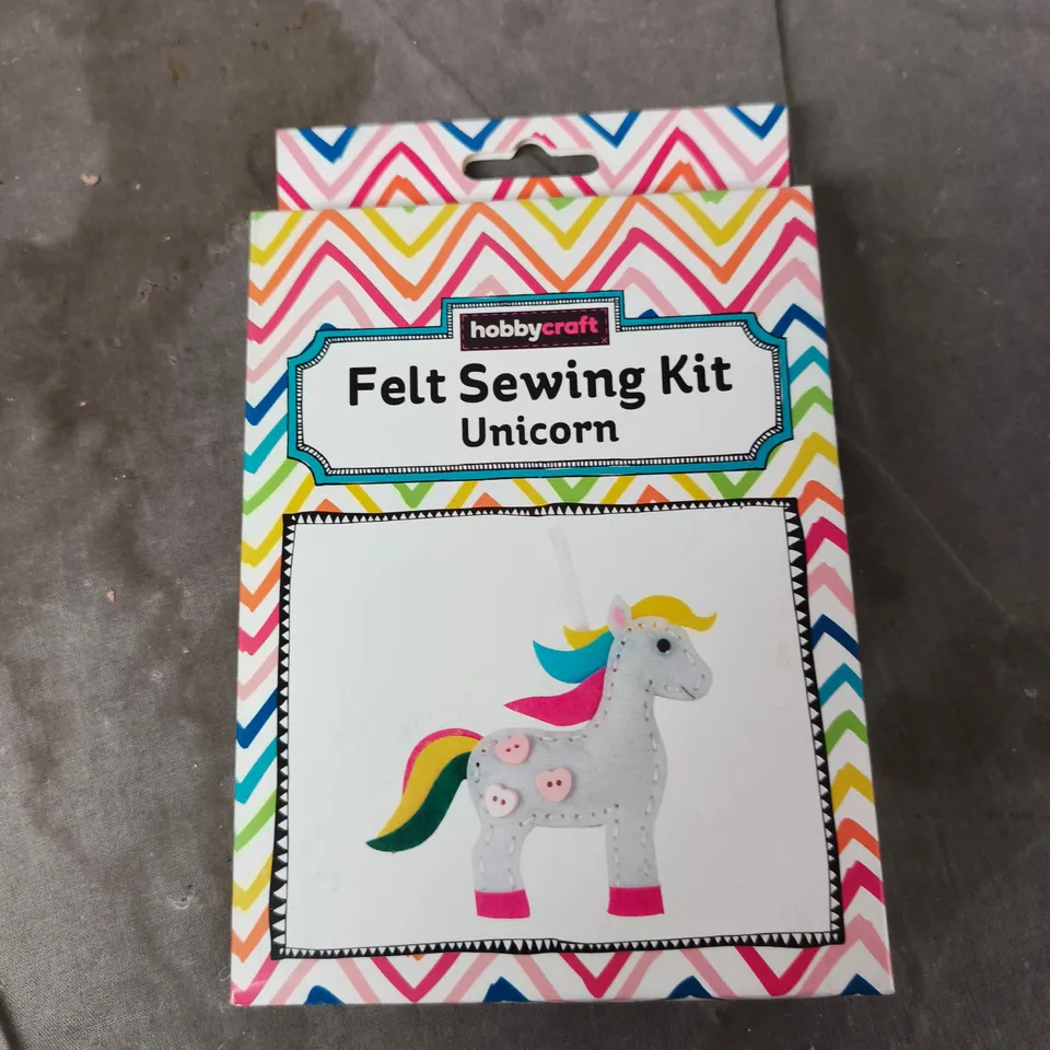 TOTE OF APPROXIMATELY 13 ASSORTED ITEMS TO INCLUDE:  FELT SEWING KIT (UNICORN)