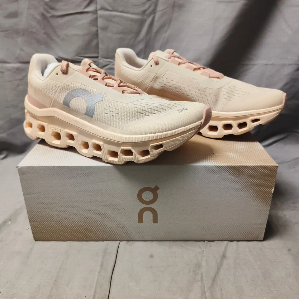 BOXED PAIR OF ON CLOUDMONSTER SHOES IN MOON/FAWN SIZE UK 6