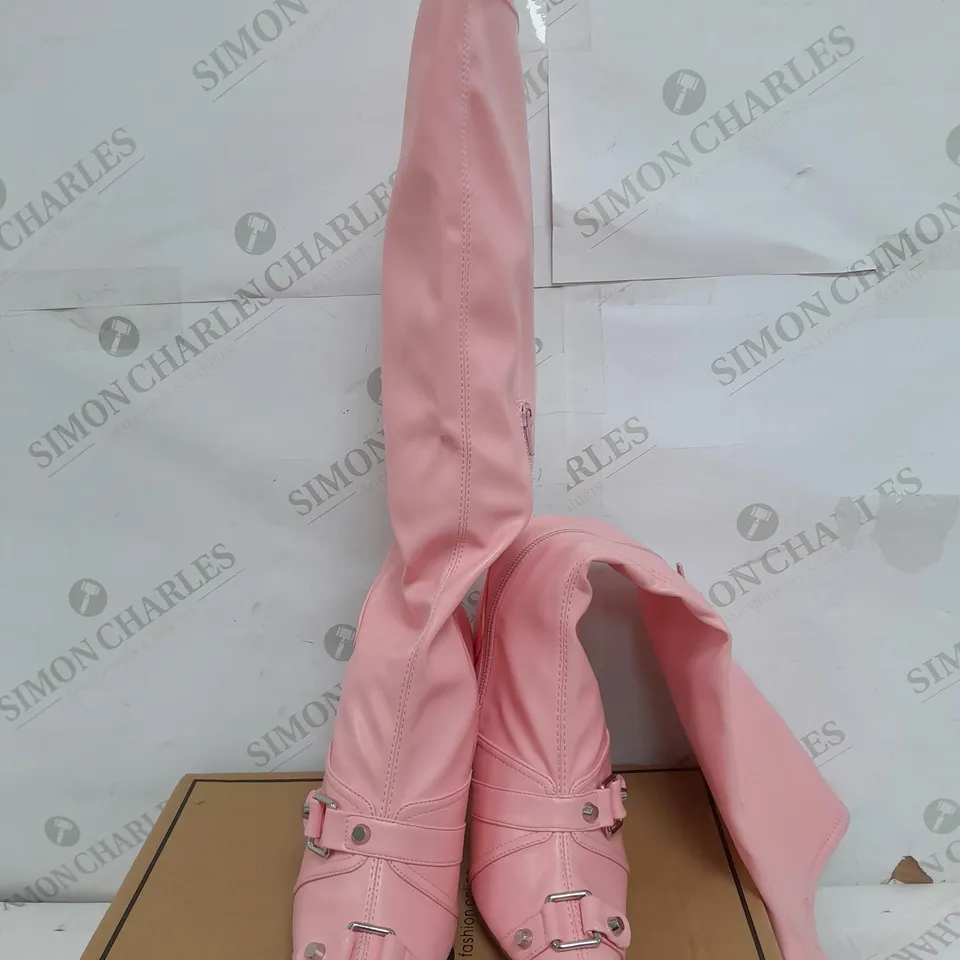 BOXED PAIR OF ASOS DESIGN CANNES HEELED HARDWARE KNEE BOOTS IN PINK - UK 5