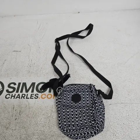 KIPLING CROSSBODY BAG WITH MONKEY CHARM – BLACK/WHITE GEOMETRIC PATTERN
