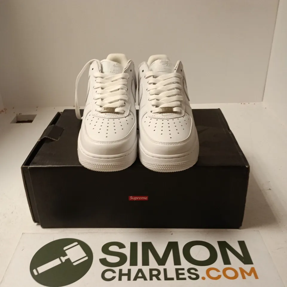 BOXED PAIR OF NIKE AIR FORCE 1 LOW SUPREME TRAINERS IN WHITE - UK 7.5