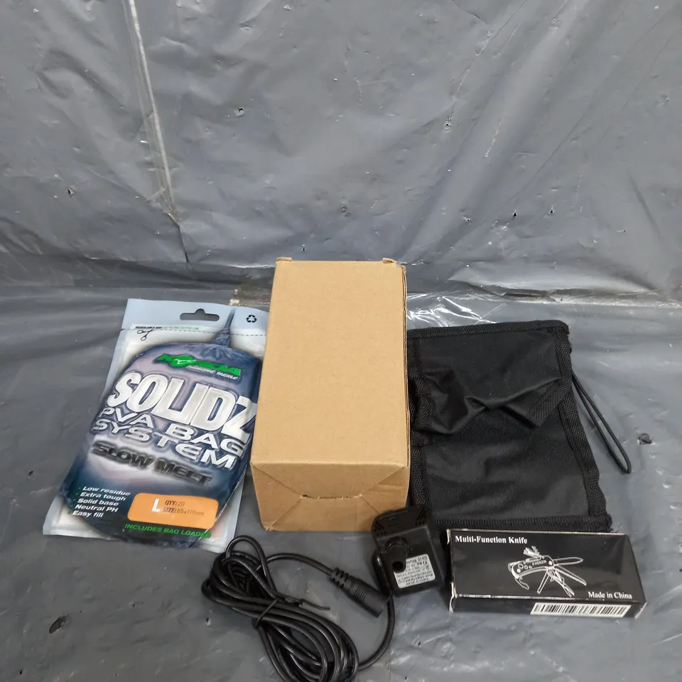 APPROXIMATELY 10 ASSORTED HOUSEHOLD ITEMS TOO INCLUDE MULTI FUNCTION KNIFE , PLUGS , PVA BAG , ETC 