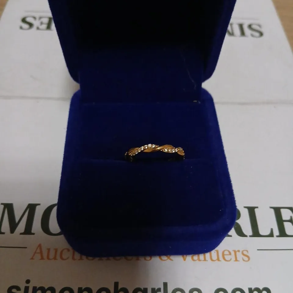 DIAMONIQUE YELLOW GOLD RING WITH ACCENT STONES (TWIST DESIGN) 