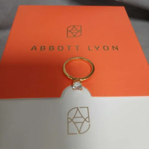 ABBOTT LYON GOLD RING WITH CLEAR STONE – ON BRANDED CARD