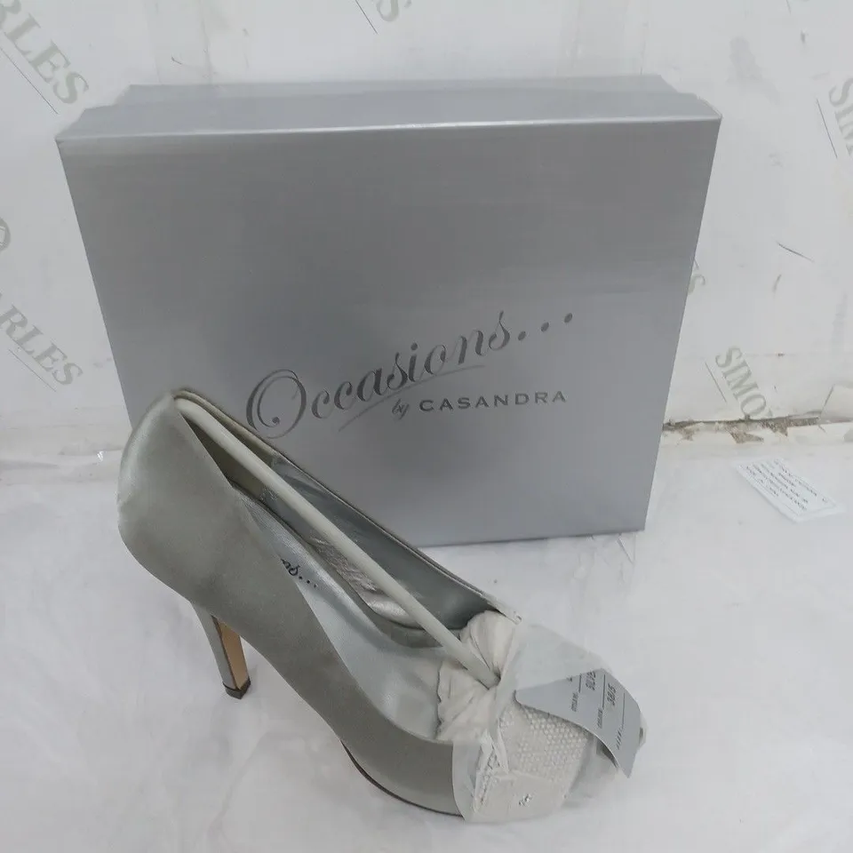 LARGE BOX OF APPROXIMATELY 10 BOXED OCCASIONS SILVER OPEN TOE HEEL IN VARIOUS SIZES 