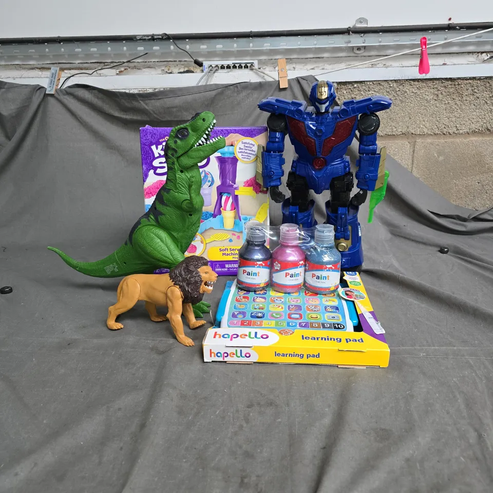 CAGE CONTAINING A LARGE QUANTITY OF KIDS TOYS AND GAMES TO INCLUDE KINETIC SAND, TRANSFORMERS FIGURE, HAPELLO LEARNING PAD, ASSORTED PAINTS, ASSORTED ANIMAL TOYS ETC