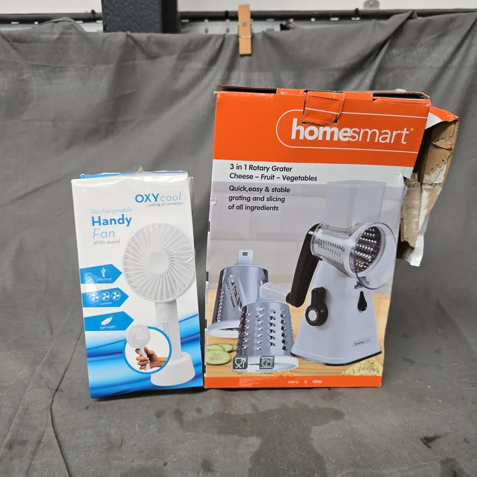 CAGE OF APPROXIMATELY 12 ASSORTED HOUSEHOLD ITEMS TO INCLUDE RECHARGEABLE HANDY FAN WITH STAND, 3-IN-1 ROTARY GRATER, ETC - COLLECTION ONLY