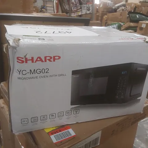 BOXED SHARP YC-MG02 MICROWAVE OVEN WITH GRILL