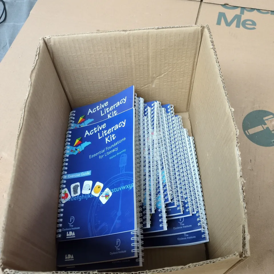 BOX OF APPROXIMATELY 20 ACTIVE LITERACY KIT (EXERCISE GUIDE)