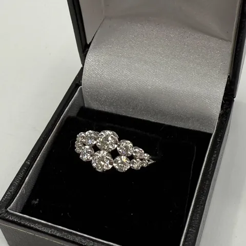 18CT WHITE GOLD TWO ROW GRADUATED RING SET WITH NATURAL DIAMONDS