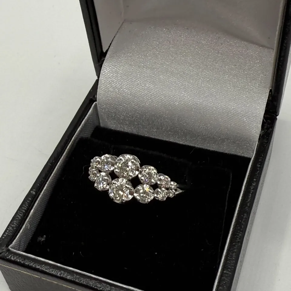 18CT WHITE GOLD TWO ROW GRADUATED RING SET WITH NATURAL DIAMONDS