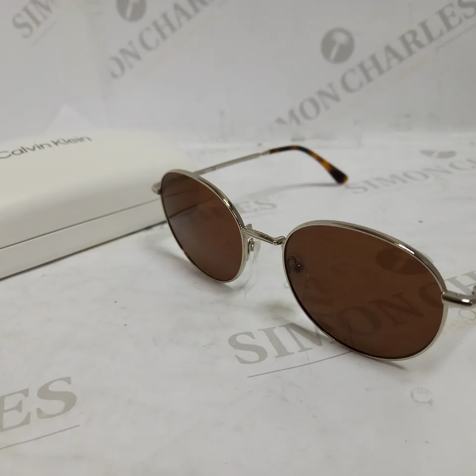 CALVIN KLEIN ROUND SUNGLASSES - SILVER RRP £150