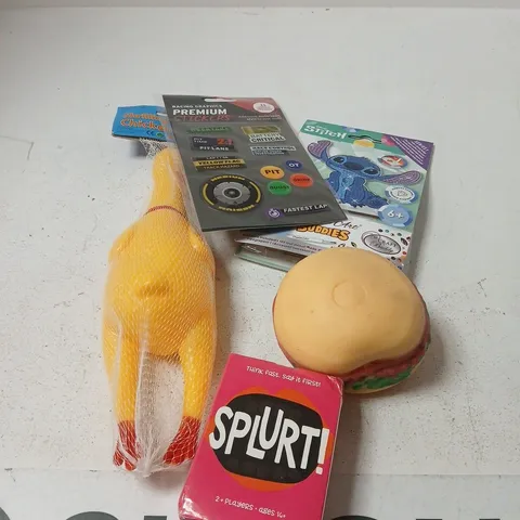 APPROXIMATELY 10 ASSORTED TOYS AND GAMES TO INCLUDE SCREAMING CHICKEN, SPLURT GAME, SQUEEZE TOY ETC