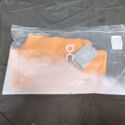 BAGGED ON CORE 2-IN-1 CROP IN TANGERINE - MEDIUM