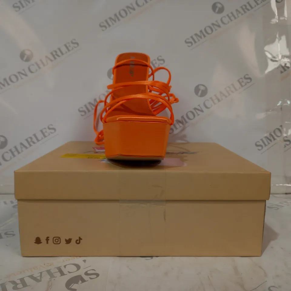 BOXED PAIR OF PUBLIC DESIRE ENDLESS POTENTIAL OPEN TOE STRAPPY PLATFORM HEELED SANDALS IN ORANGE SATIN UK SIZE 6