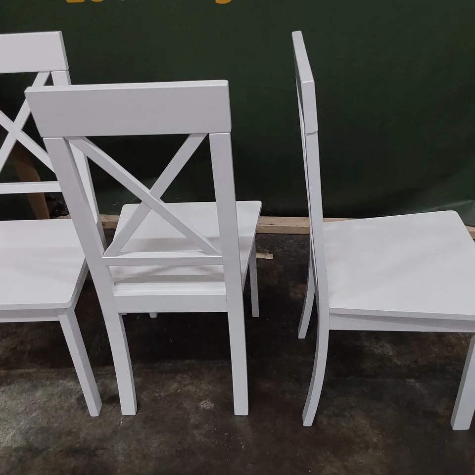 SET OF SIX WHITE PAINTED WOODEN X BACK DINING CHAIRS 