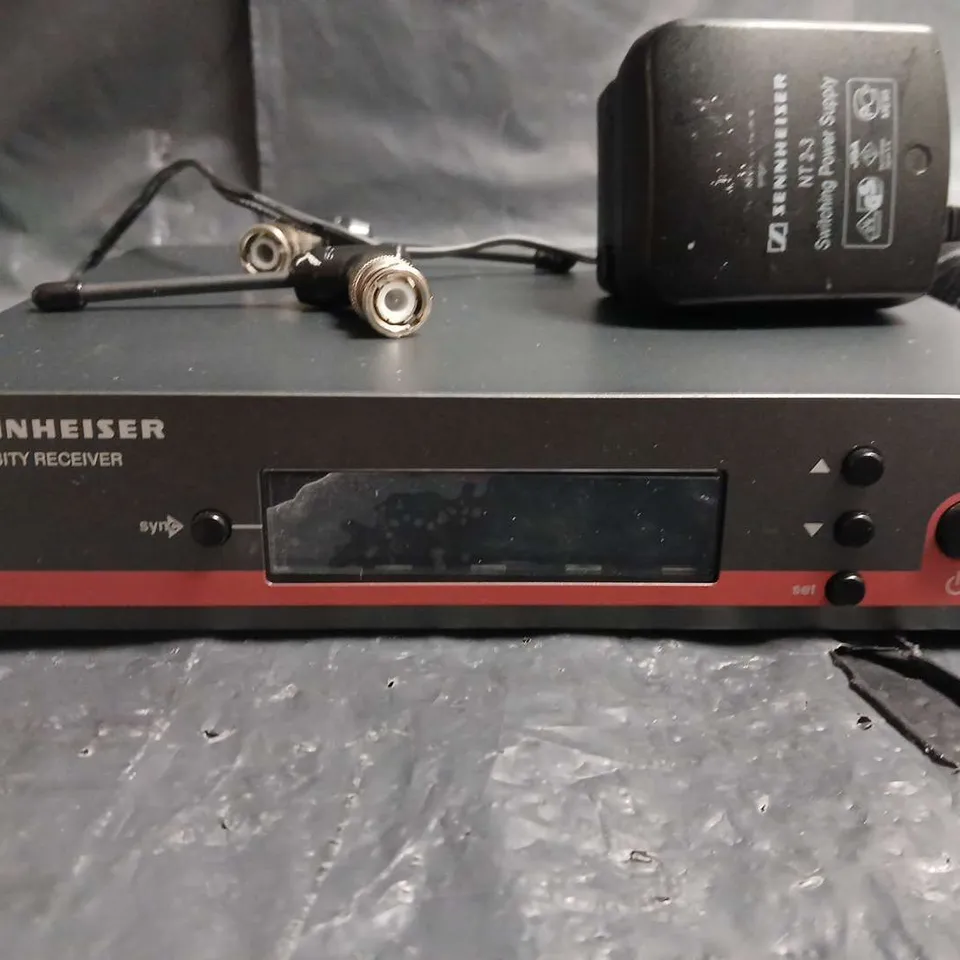 Sennheiser EW 100 wireless microphone system with handheld mic, true diversity receiver, and green Flipo case