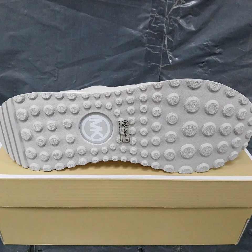 BOXED PAIR OF MICHAEL KORS BODIE SLIP ON TRAINERS - UK SIZE UNSPECIFIED
