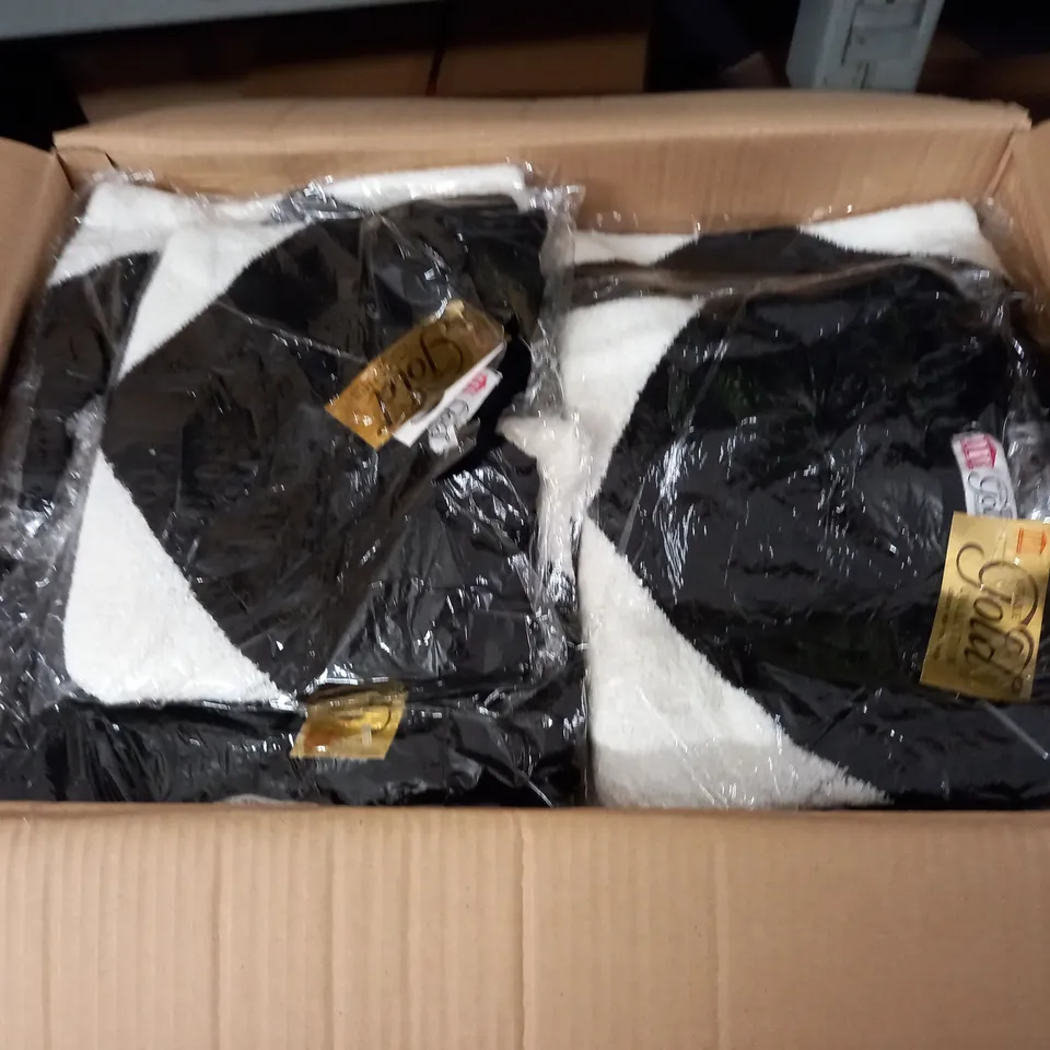 LOT OF APPROXIMATELY 60 CHEVRON V-NECK JUMPERS - SIZE UNSPECIFIED