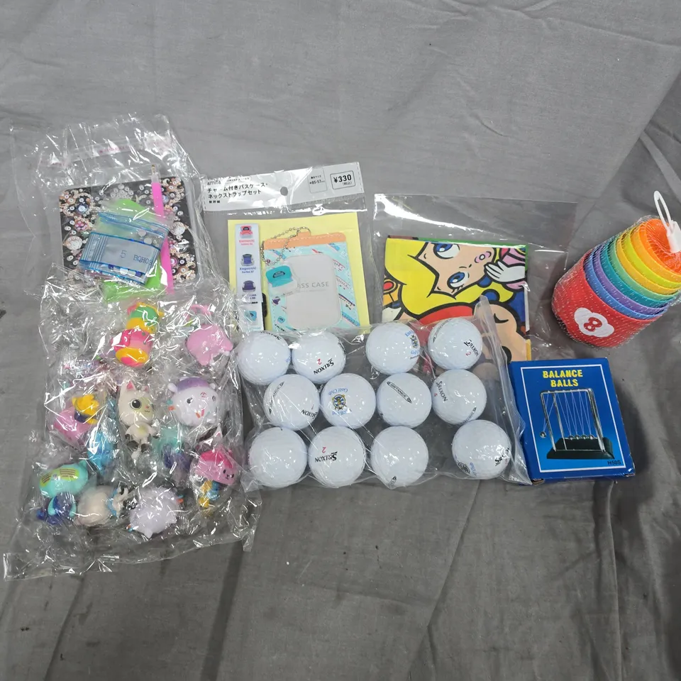 APPROXIMATELY 15 ASSORTED TOYS & GAMES PRODUCTS TO INCLUDE CUTSOM GOLF BALLS, BALANCE BALLS, BIC PENS, ETC