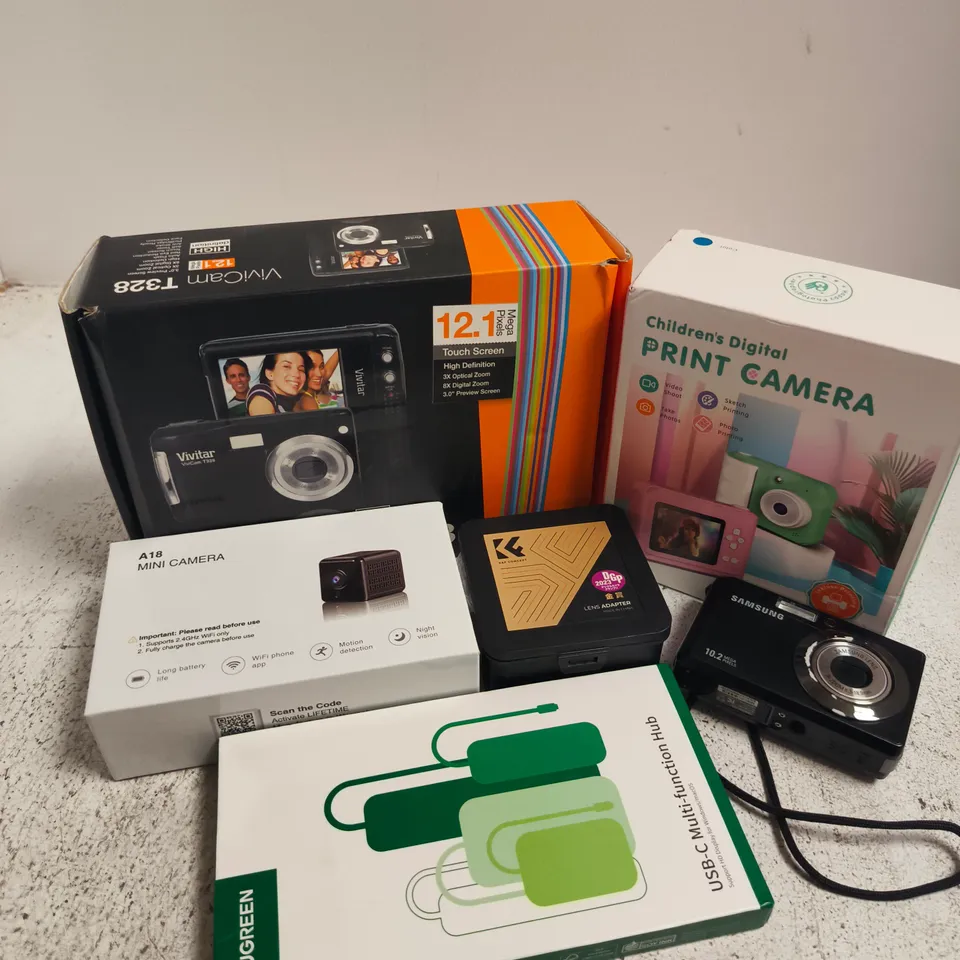 APPROXIMATELY 12 ASSORTED ELECTRICAL ITEMS TO INCLUDE SAMSUNG CAMERA, USB-C MULTIFUNCTIONAL HUB, LENS ADAPTOR, ETC